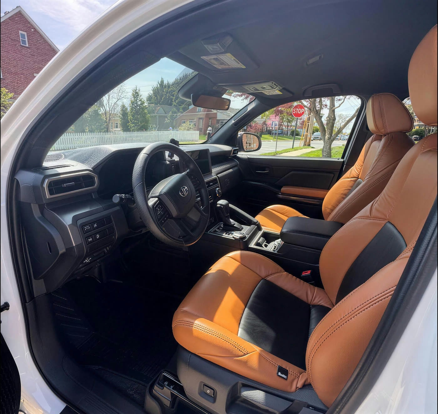 Toyota Tacoma cab with cleaned and conditioned tan and black leather seats